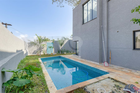 Casa à venda com 4 suítes no condomínio Reserva Robélia, São Paulo - SP