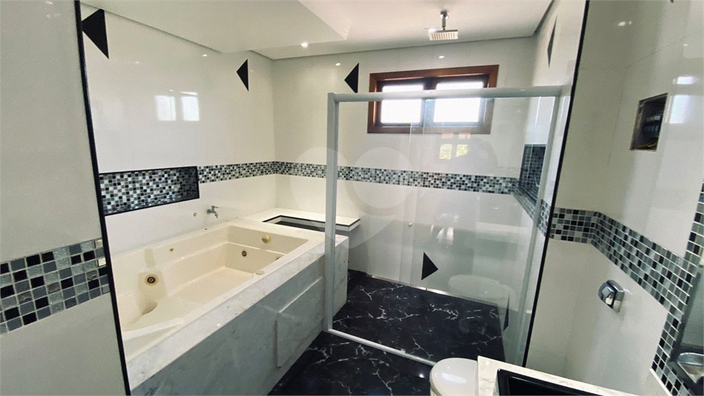 Casa à venda com 5 suítes no condomínio Suíça da Cantareira, Mairiporã - SP