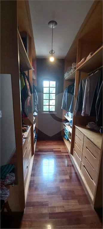 Casa à venda com 4 suítes no condomínio Alpes da Cantareira, Mairiporã - SP