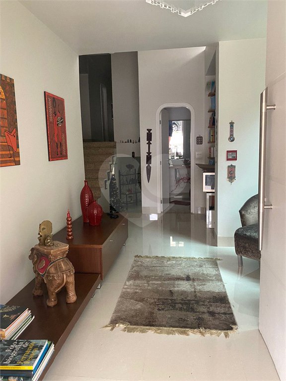 Casa à venda com 4 suítes no condomínio Granja Morumbi, São Paulo - SP