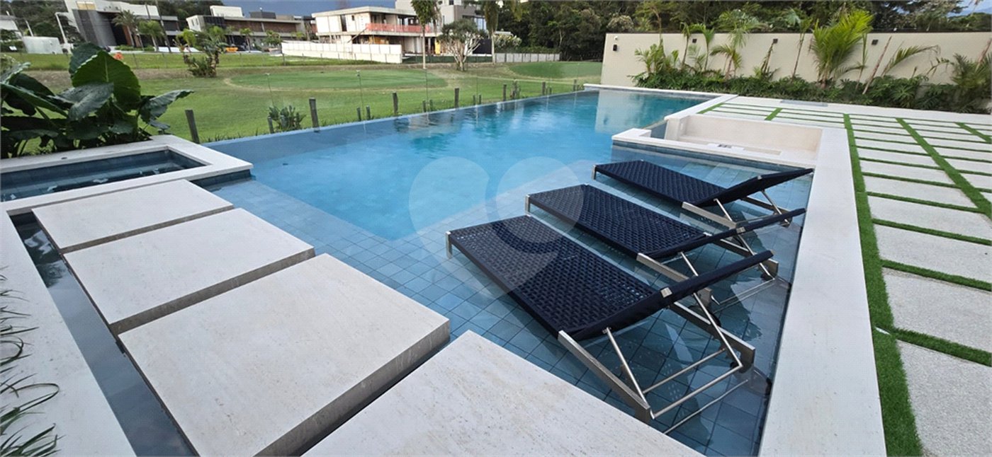 Casa à venda com 6 suítes no condomínio Riviera de São Lourenço, Bertioga - SP