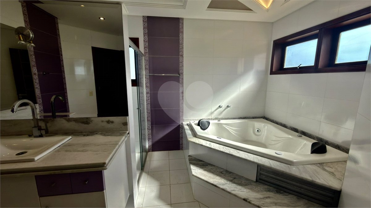 Casa à venda com 4 suítes no condomínio Parque Village Castelo, Itu - SP