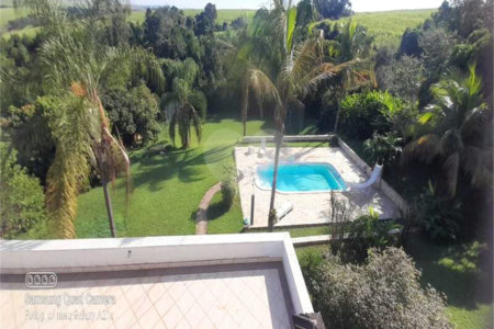 Casa à venda com 4 suítes no condomínio Residencial Vale das Laranjeiras, Indaiatuba - SP