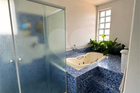 Casa à venda com 5 suítes no condomínio Residencial Bougainville, Campinas - SP