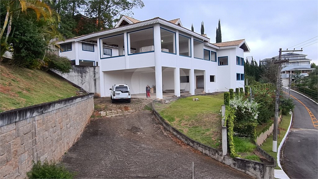Casa à venda com 4 suítes no condomínio Suíça da Cantareira, Mairiporã - SP