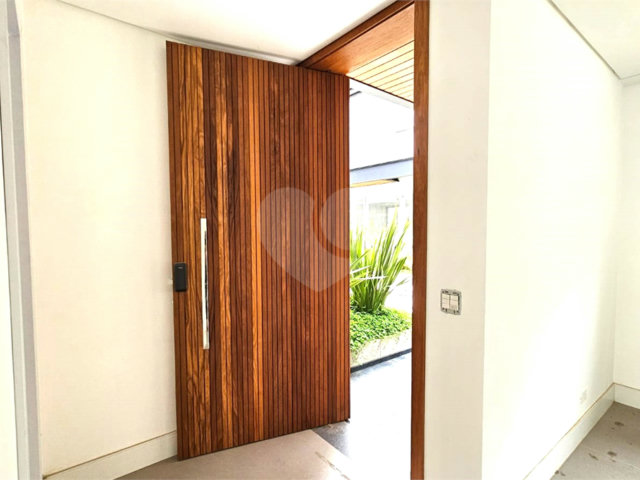 Casa à venda com 4 suítes no condomínio Vila Arese, São Paulo - SP