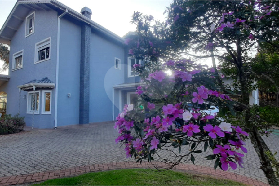 Casa à venda com 4 suítes no condomínio Suíça da Cantareira, Mairiporã - SP
