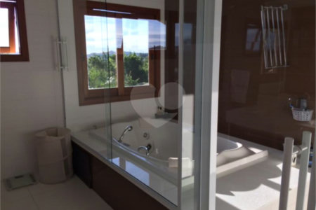 Casa à venda com 4 suítes no condomínio São Joaquim, Vinhedo - SP
