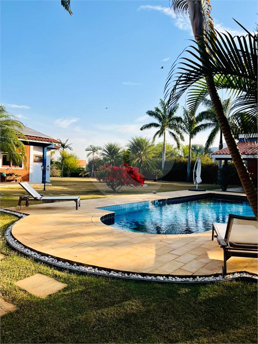 Casa à venda com 4 suítes no condomínio Residencial Vale das Laranjeiras, Indaiatuba - SP