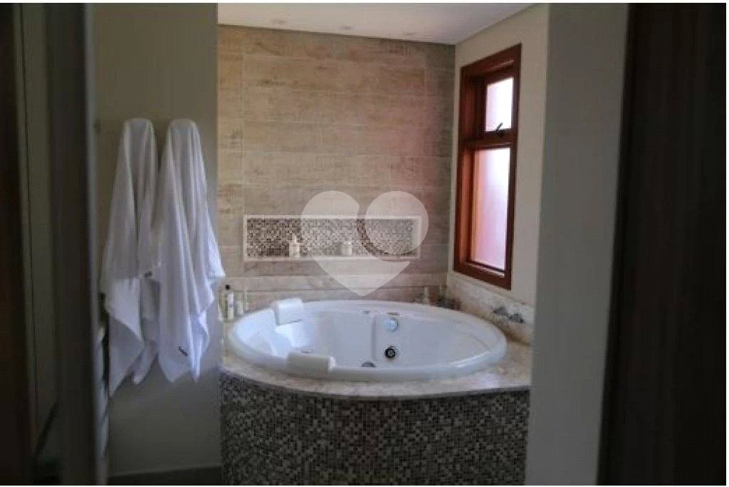 Casa à venda com 4 suítes no condomínio Suíça da Cantareira, Mairiporã - SP