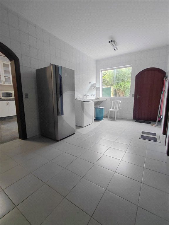 Casa à venda com 4 suítes no condomínio Ville Bourghese, São Paulo - SP