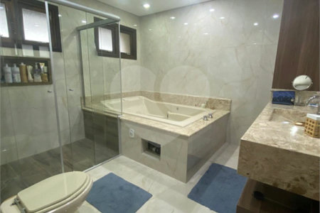 Casa à venda com 4 suítes no condomínio Vale da Santa Fé, Vinhedo - SP