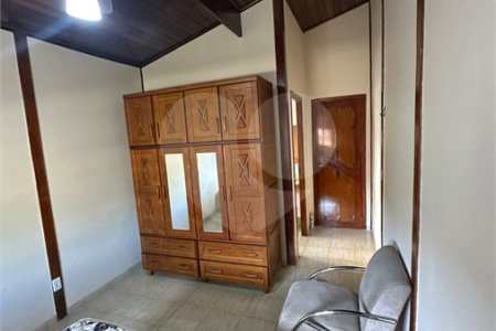 Casa à venda com 3 quartos, sendo 1 suíte,  no condomínio Morada da Praia, Bertioga - SP