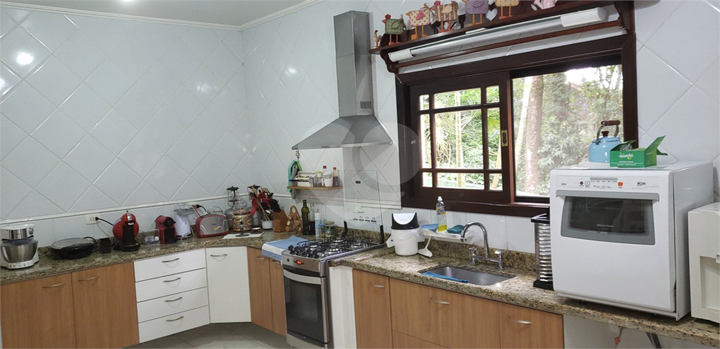 Casa à venda com 3 quartos, sendo 1 suíte, no condomínio Alpes da Cantareira, Mairiporã - SP
