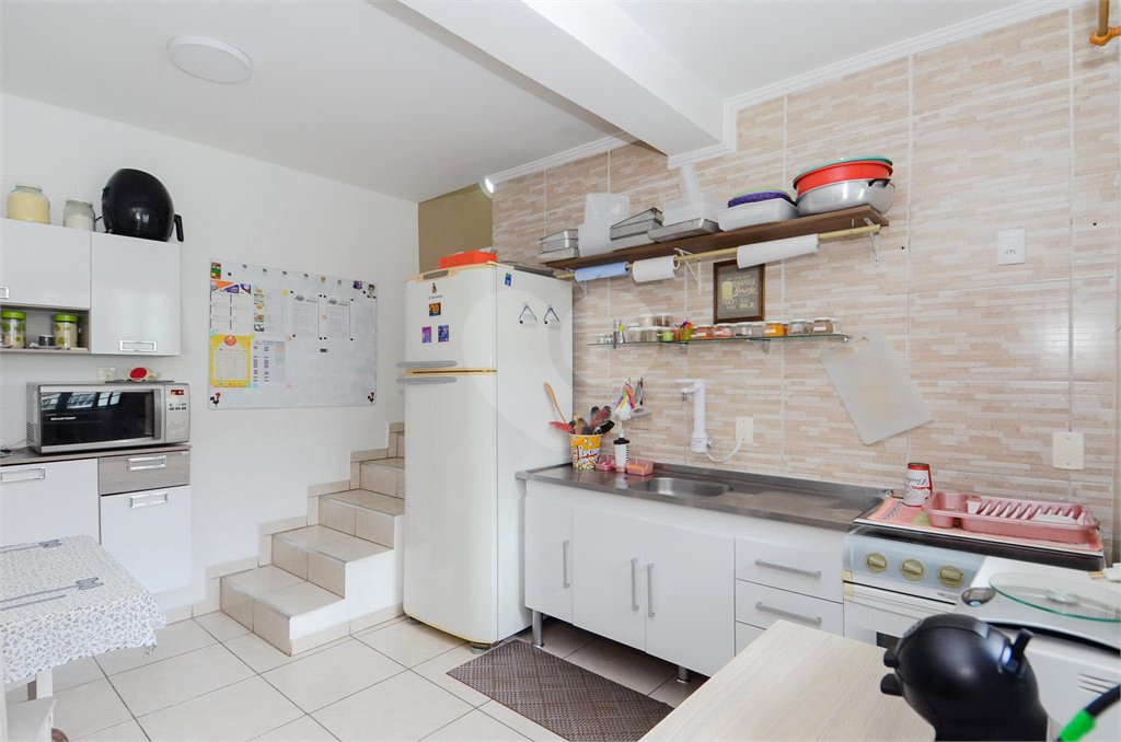 Casa à venda com 4 quartos, sendo 1 suíte, em Jardim Nova Taboão, Guarulhos, SP