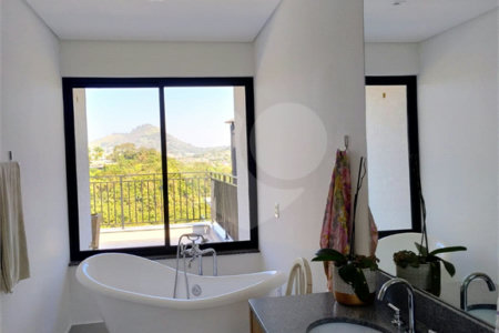 Casa à venda ou para alugar com 4 suítes no condomínio Itaporã, Atibaia - SP