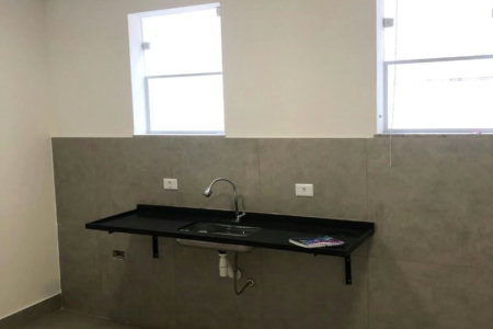Casa com 3 dormitórios à venda, 116 m² por R$ 690.000,00 - Gonzaga - Santos/SP