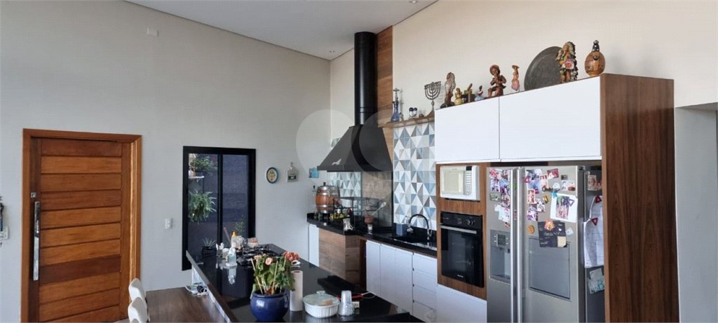 Casa à venda com 4 suítes no condomínio Osato, Atibaia - SP