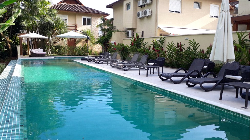 Casa à venda com 4 quartos, sendo 3 suítes, no condomínio Residencial Vila Esmeralda, São Sebastião - SP
