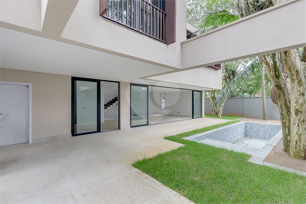 Casa à venda com 4 suítes no condomínio Garda, São Paulo - SP