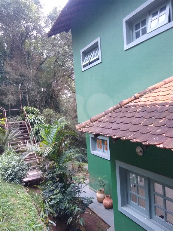 Casa à venda com 4 suítes no condomínio Alpes da Cantareira, Mairiporã - SP