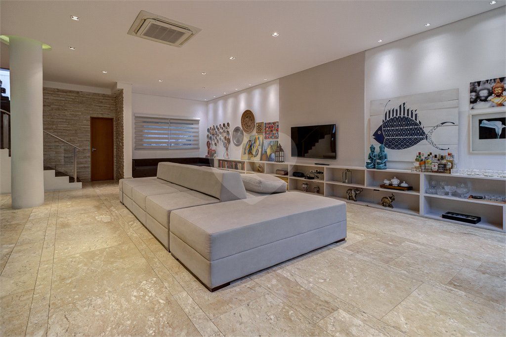 Casa à venda com 4 suítes no condomínio Ville de France, São Paulo - SP