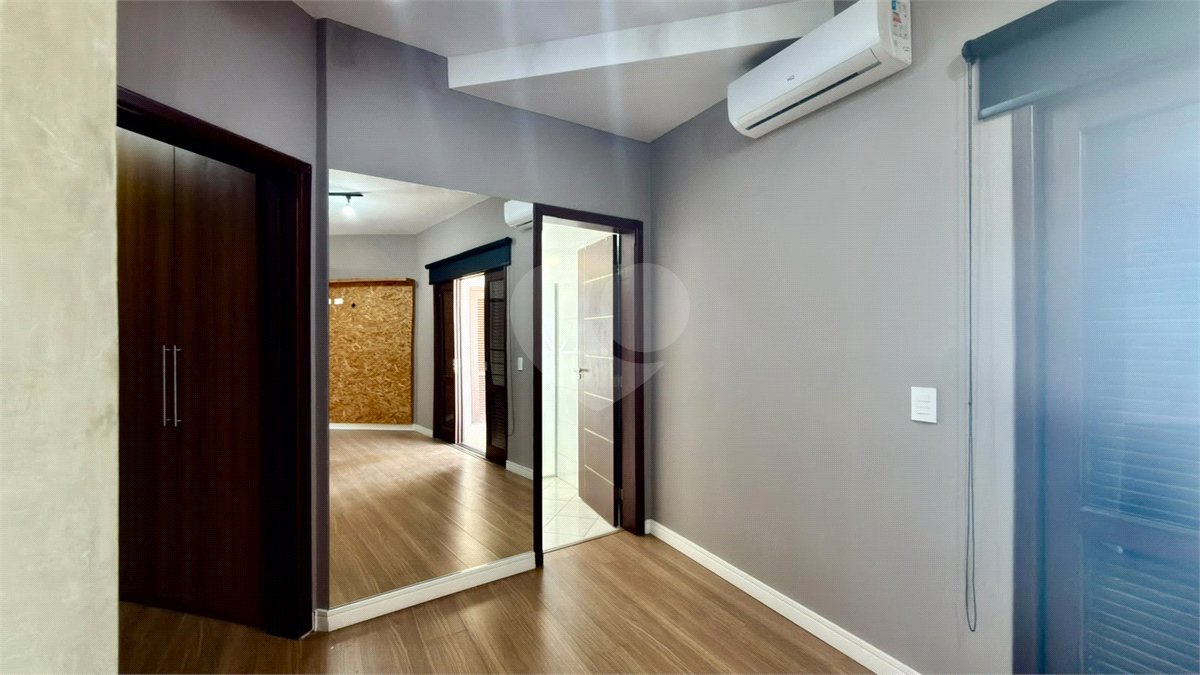 Casa à venda com 4 suítes no condomínio Parque Village Castelo, Itu - SP