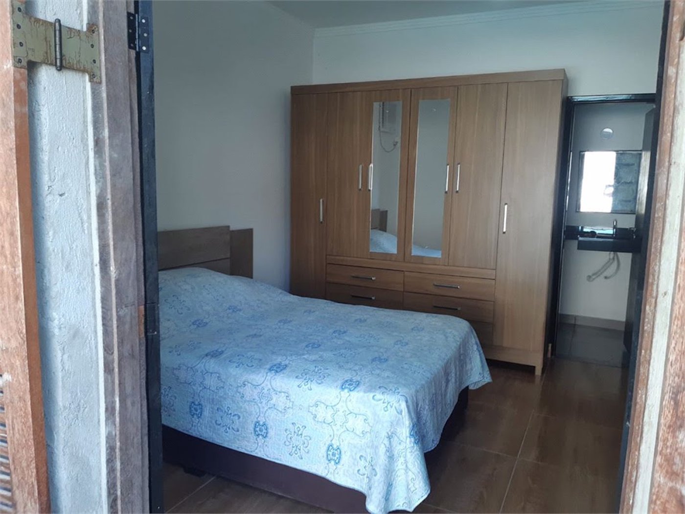 Casa com 4 dormitórios à venda, 180 m² por R$ 650.000,00 - Jardim Virginia - Guarujá/SP