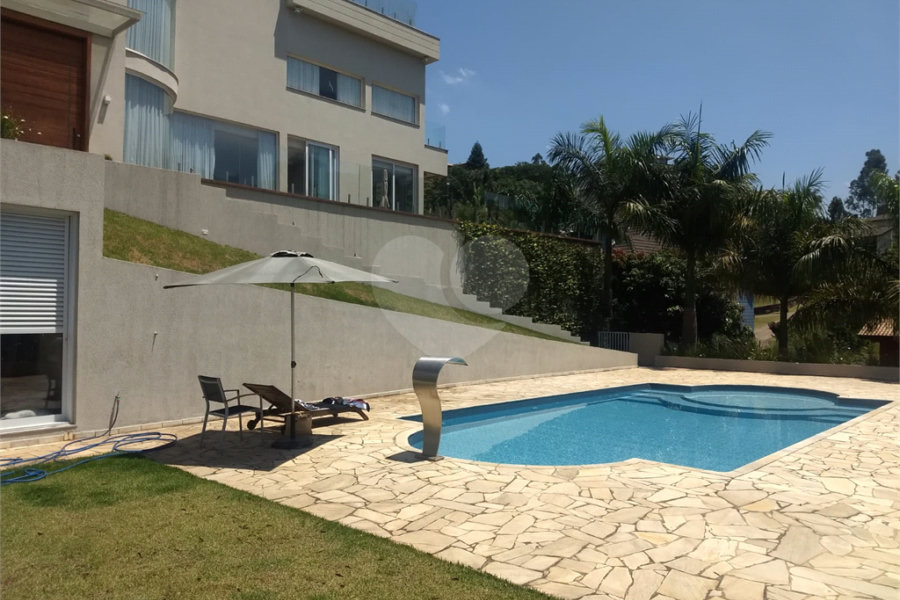 Casa à venda ou para alugar com 4 suítes no condomínio Suíça da Cantareira, Mairiporã - SP