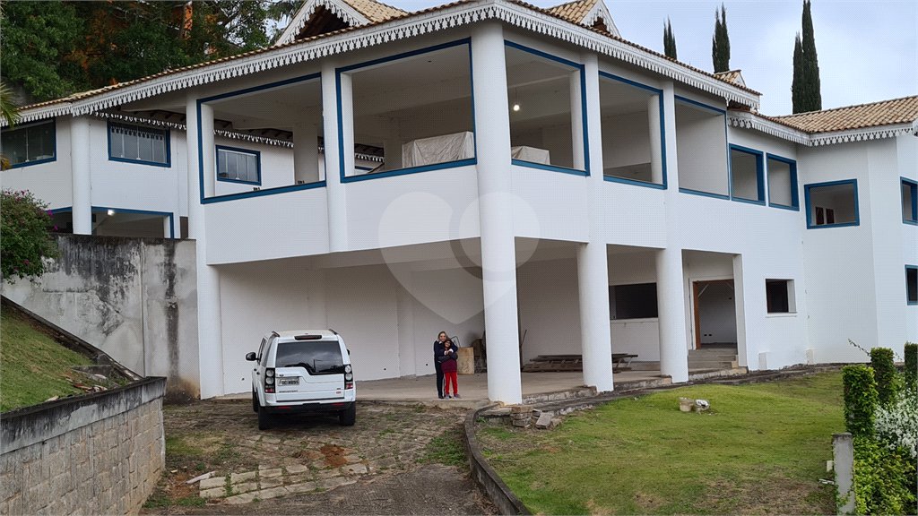 Casa à venda com 4 suítes no condomínio Suíça da Cantareira, Mairiporã - SP