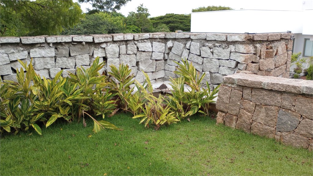 Casa à venda com 4 suítes no condomínio Estância Marambaia, Vinhedo - SP