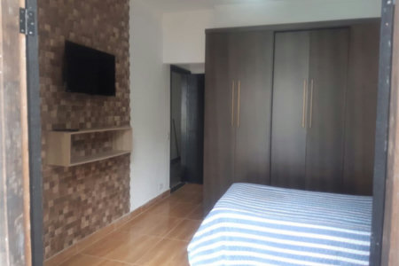 Casa com 4 dormitórios à venda, 180 m² por R$ 650.000,00 - Jardim Virginia - Guarujá/SP