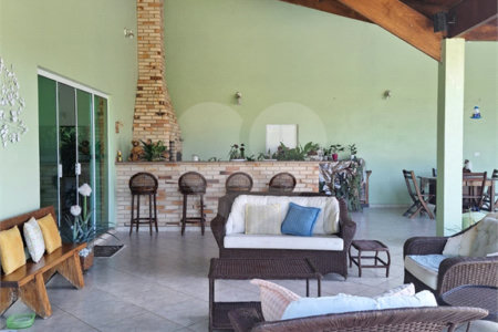 Casa à venda com 4 suítes no condomínio Bougainville, Peruíbe - SP