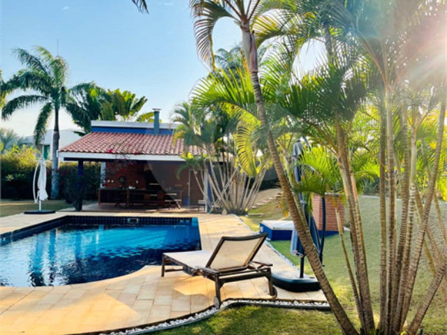 Casa à venda com 4 suítes no condomínio Residencial Vale das Laranjeiras, Indaiatuba - SP