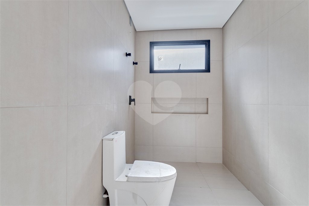 Casa à venda com 4 suítes no condomínio Villa Suiça, São Paulo - SP