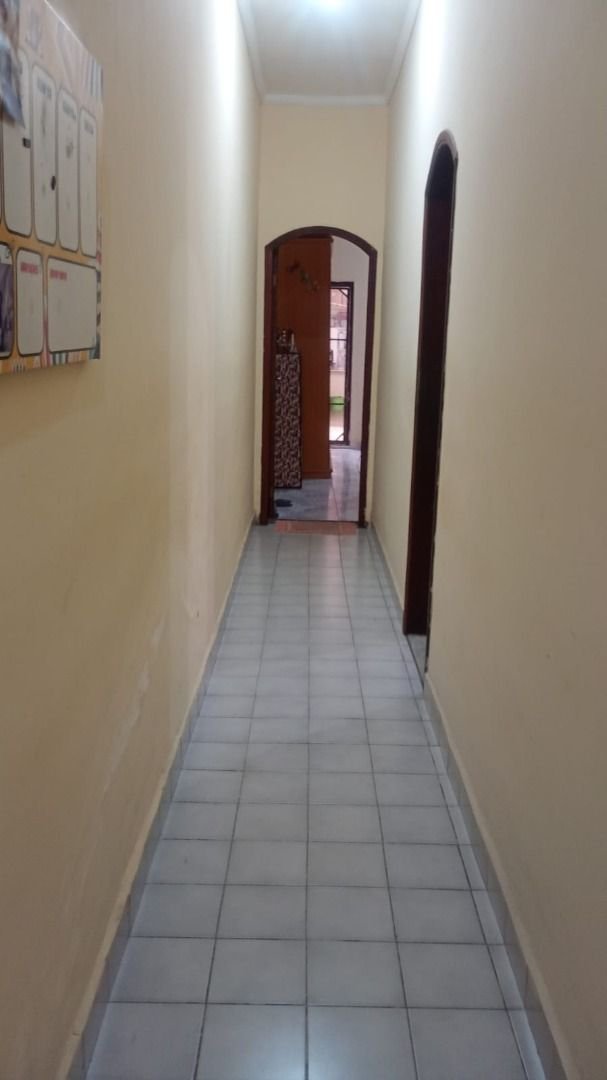 Casa com 3 dormitórios à venda, 140 m² por R$ 425.000,00 - Parque Bitaru - São Vicente/SP