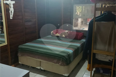 Casa à venda com 4 quartos, sendo 1 suíte,  no condomínio Morada da Praia, Bertioga - SP