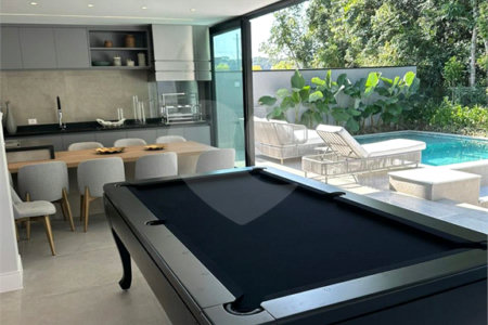 Casa à venda com 6 suítes no condomínio Golf CL, Bertioga - SP