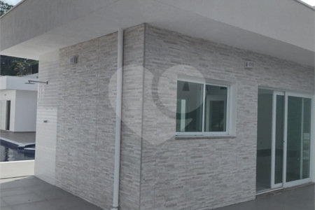 Casa à venda com 4 suítes no condomínio Estância Marambaia, Vinhedo - SP