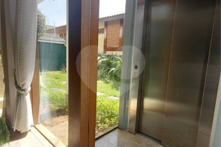 Casa à venda com 4 suítes no condomínio Ville Bourghese, São Paulo - SP