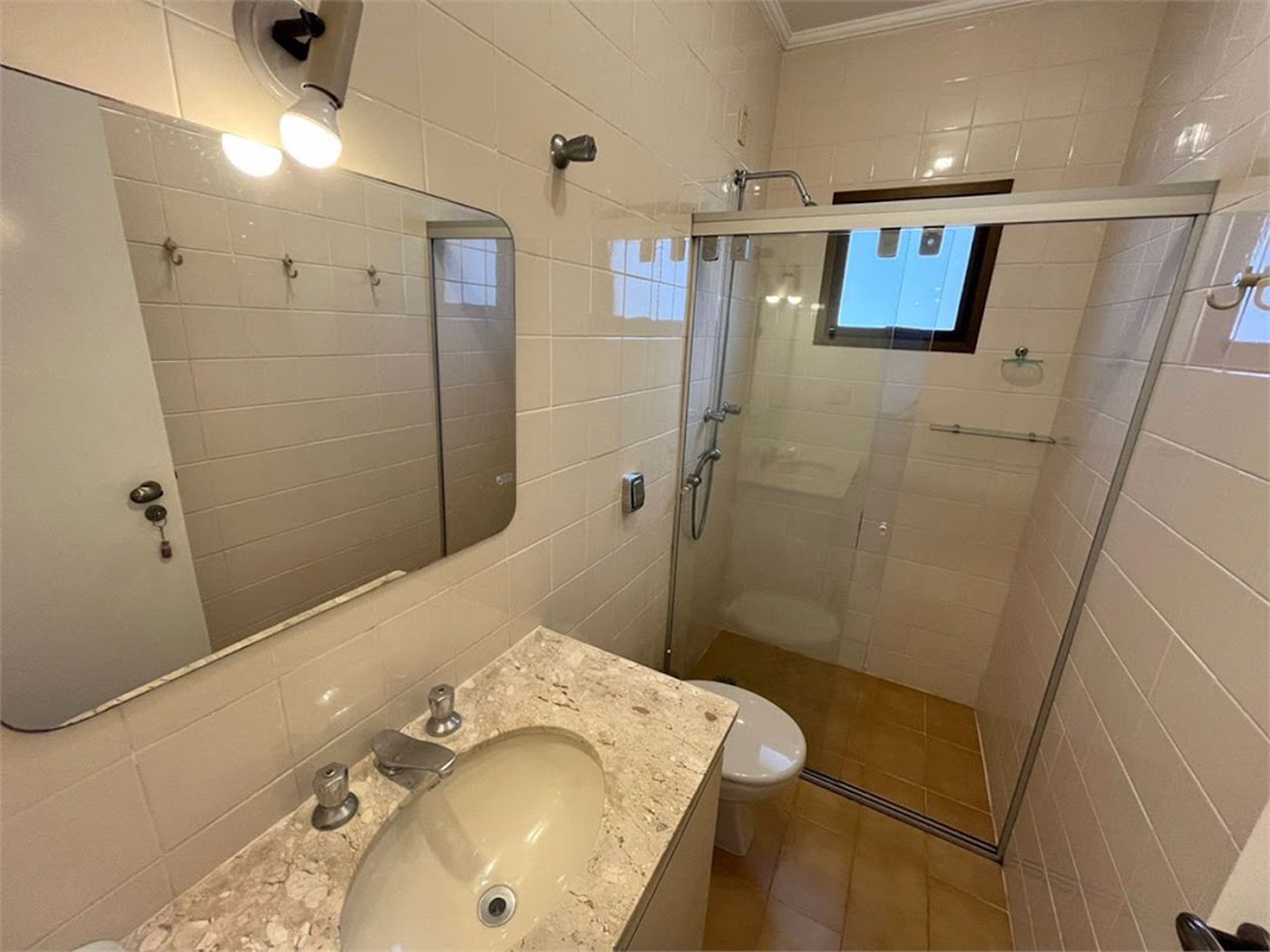Apartamento com 4 dormitórios à venda, 259 m² por R$ 900.000,00 - Jardim Três Marias - Guarujá/SP