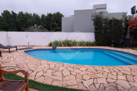 Casa para alugar com 4 quartos, sendo 3 suítes,  no condomínio Figueira Garden, Atibaia - SP