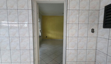 Sobrado com 3 dormitórios à venda, 129 m² por R$ 638.000,00 - Encruzilhada - Santos/SP