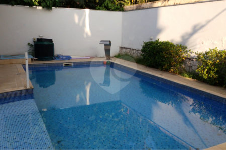 Casa à venda com 4 suítes no condomínio Aruã, Mogi das Cruzes - SP
