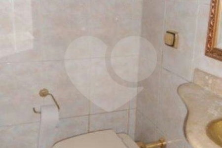 Casa térrea com salas comerciais em anexo à venda na região da Moóca