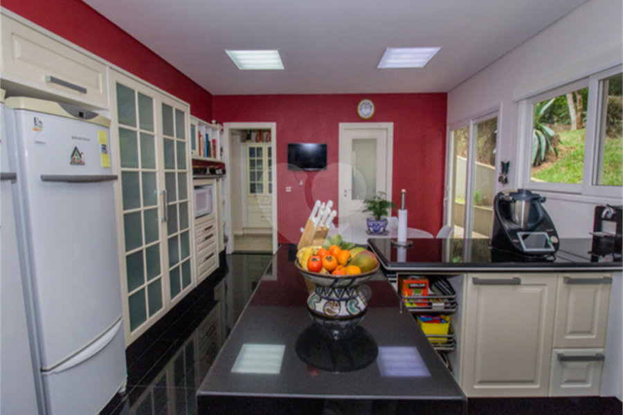 Casa à venda com 4 suítes no condomínio Alpes da Cantareira, Mairiporã - SP