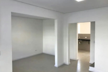 Casa com 3 dormitórios à venda, 116 m² por R$ 690.000,00 - Gonzaga - Santos/SP