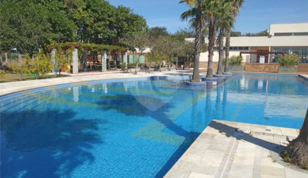 Terreno no Cyrela, plano e próximo do clube.