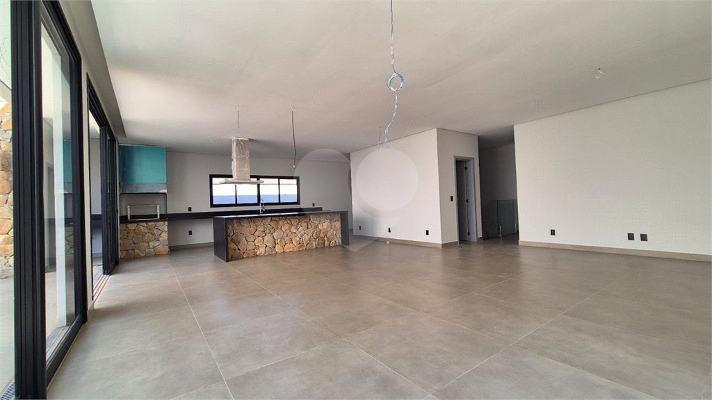 Casa à venda com 4 suítes no condomínio Alphaville Nova Esplanada 1, Votorantim - SP