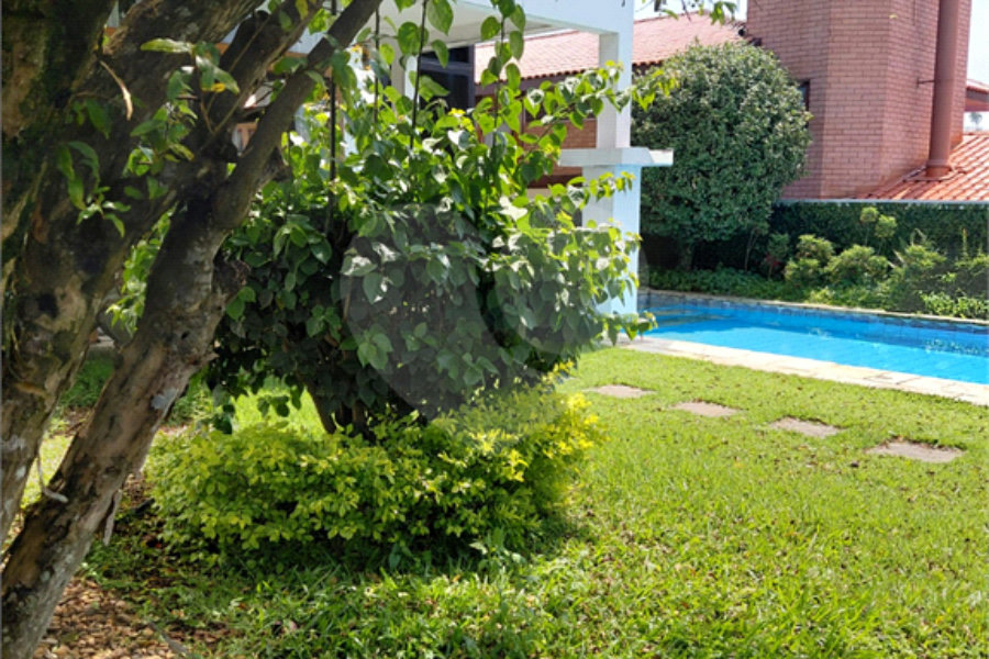 Casa à venda com 4 suítes no condomínio Ville Bourghese, São Paulo - SP